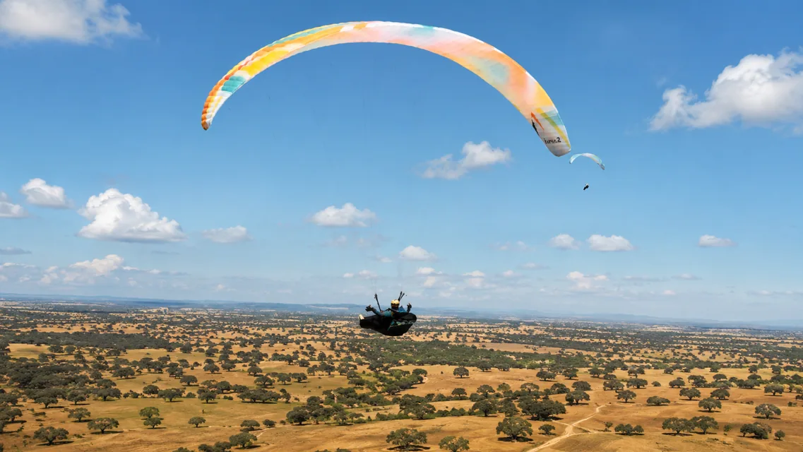 Paraglider above the Alentejo plains