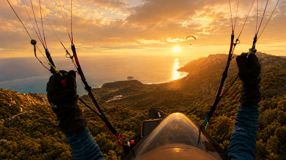 Autumn paragliding in Portugal &mdash; golden light at Sesimbra
