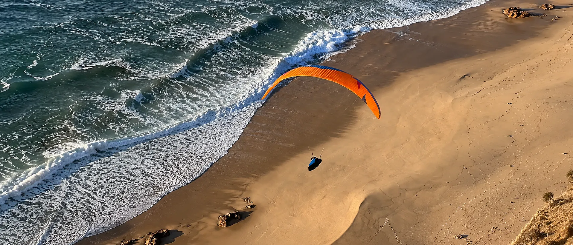 Paragliding over the Sesimbra coastline, Portugal